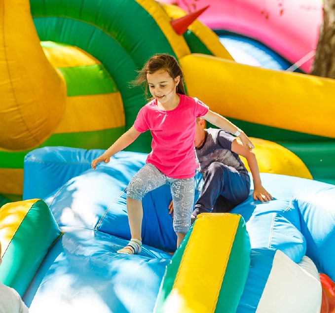 kid jumping in bounce house Southaven